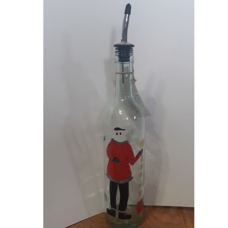 Colorful Mummer a Newfoundland tradition painted on a bottle